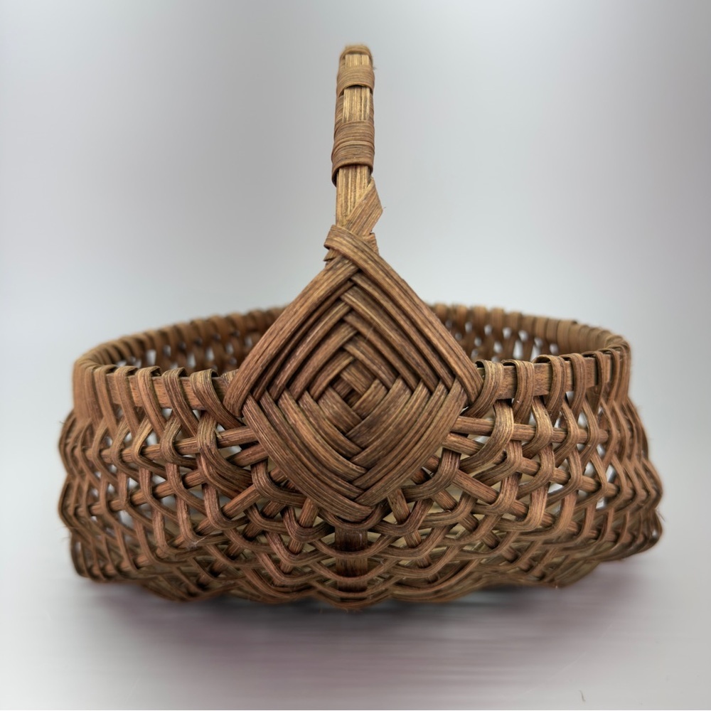 Vintage Handwoven Wicker Buttocks Basket